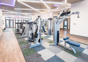 2-Story, tech advanced fitness center with cardio and strength training equipment